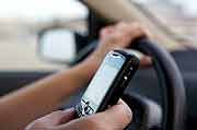 With Kids In Car, Parents Still Likely to Use Cellphones